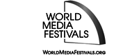 Logo der World Media Festivals mit stilisiertem Globus-Symbol und Website-URL WorldMediaFestivals.org